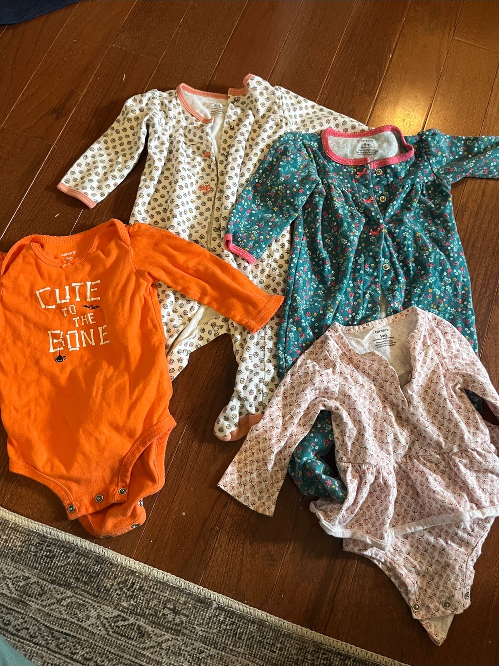 Carter's 9 month baby girl pajama and onesie bundle